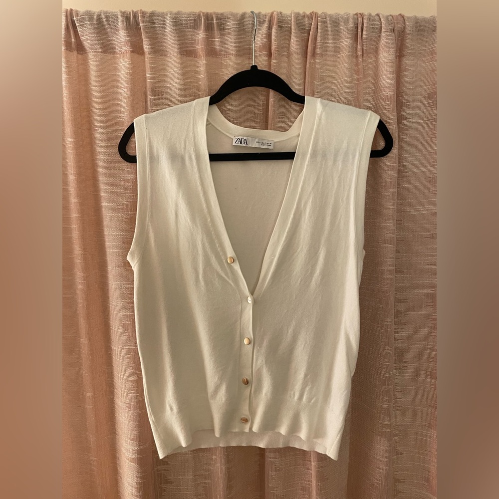 White sweater vest!